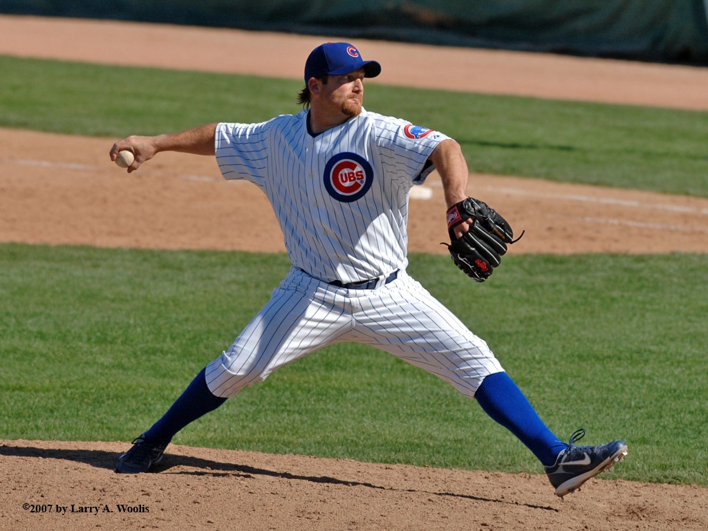 Ryan Dempster and his son stand on the field before the 2008 MLB